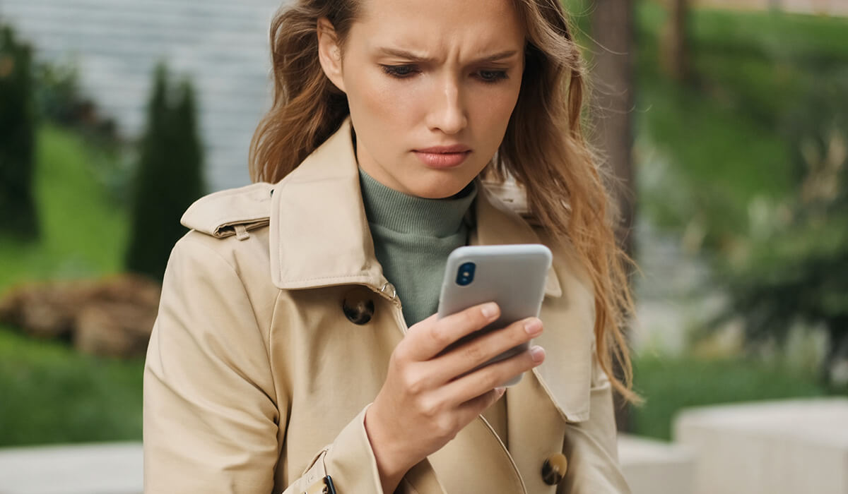 Image of a woman prepared to protect herself from online scams.